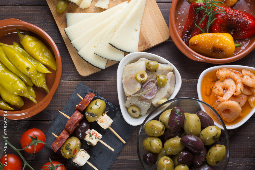 Wall mural Top view of spanish tapas starters