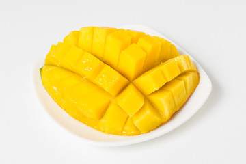 Fresh mango on the white plate