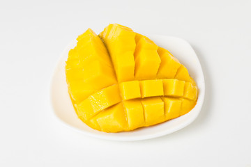 Fresh mango on the white plate
