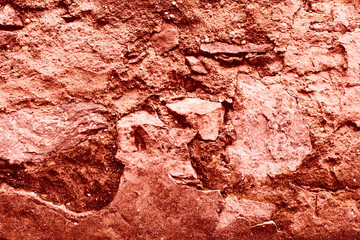 Wall fragment with scratches and cracks