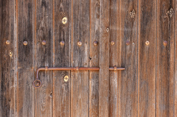 metal latch on the wooden gate