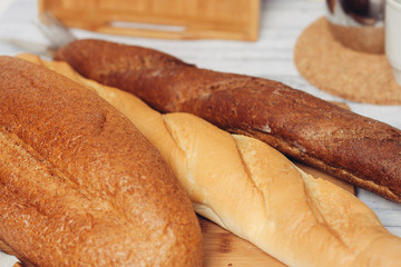 light and dark baguette, a loaf on the table
