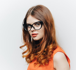 Fototapeta premium cute red-haired woman with glasses