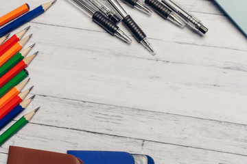 stationery on a wooden background