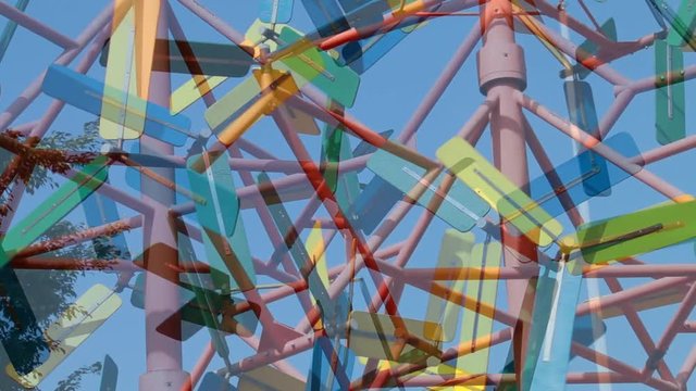 Windmills with rotating colored blades