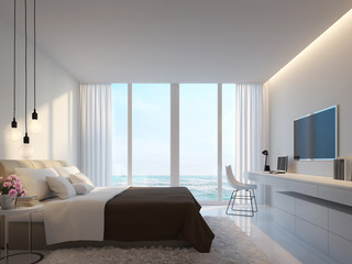 Modern white bedroom with sea view 3d rendering image,Decorate wall with hidden warm light,white furniture,There are large windows Looking to beautiful sea view