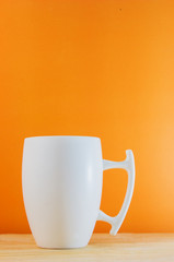 cup coffee on wood colorful background