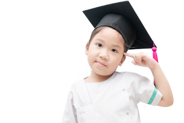 Asian school kid graduate thinking with graduation cap