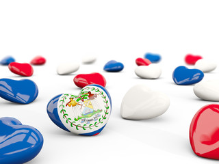 Heart with flag of belize isolated on white