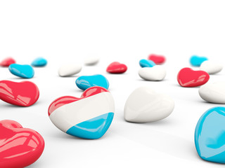 Heart with flag of luxembourg isolated on white