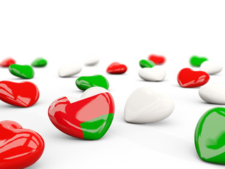 Heart with flag of oman isolated on white