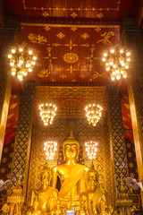 Buddha statue in Wat Phra That Hariphunchai, Lamphun province, north of Thailand