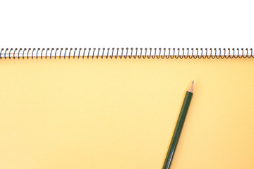 Yellow note book isolated on a white background