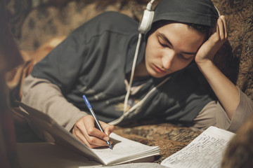 Student guy studying at home