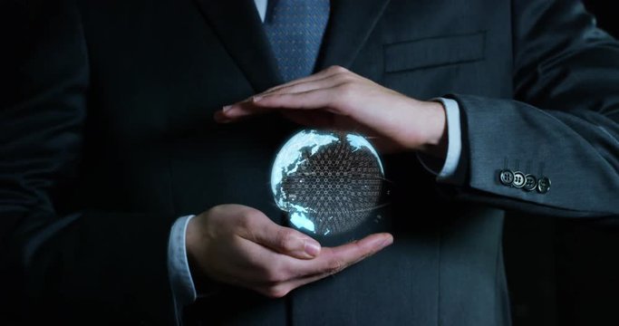 world growing in the hands of an experienced seller or bank or insurance broker. concept for investment and passive income for retirement and annuities also health insurance concept or bank 