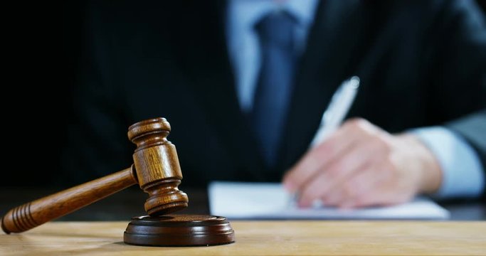 hand shake, auction scene of lawyers or notaries with gavel judge for the insurance compensation or criminal cases. concept of law and lawyer, judiciary and legislature applied to the democratic law.