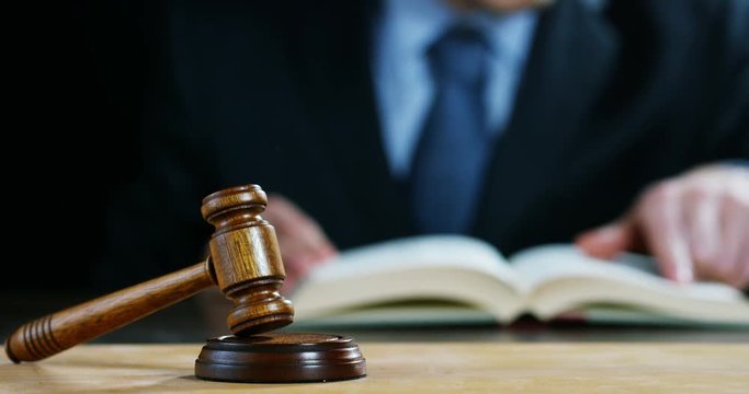 hand shake, auction scene of lawyers or notaries with gavel judge for the insurance compensation or criminal cases. concept of law and lawyer, judiciary and legislature applied to the democratic law.