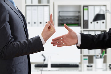Businessman Showing Middle Finger To Partner