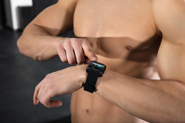 An Athlete Man With A Smart Watch