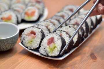 maki sushi rolls japan food on plate with foodsticks