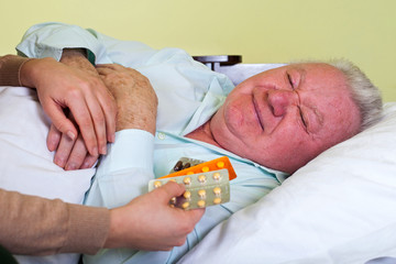 Elderly man receiving medication