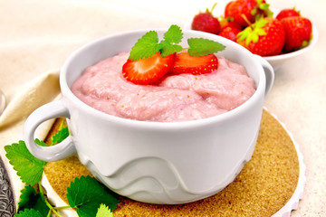 Soup strawberry in bowl on granite table