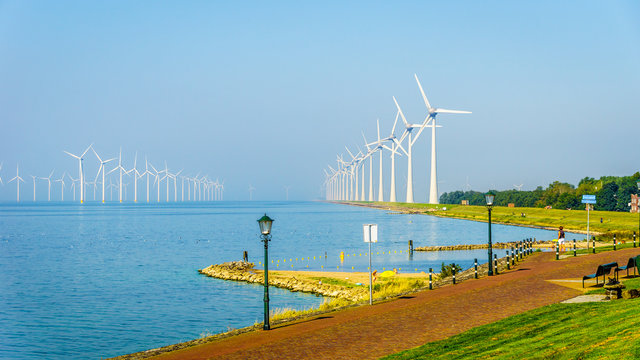 Wind Farm in the inland sea named IJselmeer seen from the historic fishing village of Urk in the Netherlands