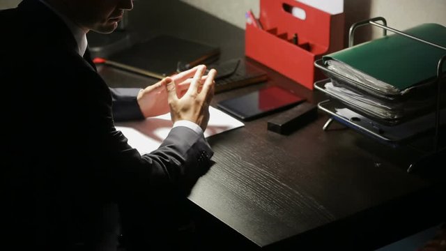 corruption, bribery and fraud concept - close up of businessman taking money