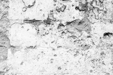 Wall fragment with scratches and cracks