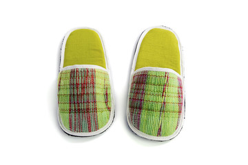 Pair of house shoes on a white background