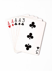 Poker hand rankings symbol set Playing cards in casino: four of a kind on white background, luck abstract, vertical photo with copyspace closeup