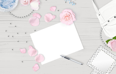 White feminine background. Flat lay. Pink roses, mirror, white bag. Place for text. Cheerful mind every day Mother's day