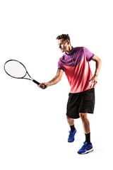Fototapeta na wymiar Young man playing tennis