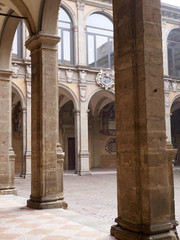 Fototapeta premium tower and courtyard of Archiginnasio palace - the first official headquarters for the University
