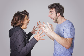 Young couple in a relationship fighting and arguing passionately