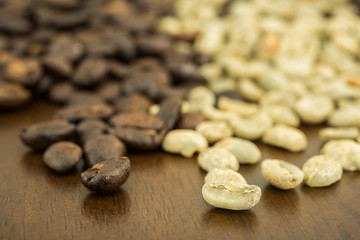 roasted coffee beans on the wooden table, can be used as a background