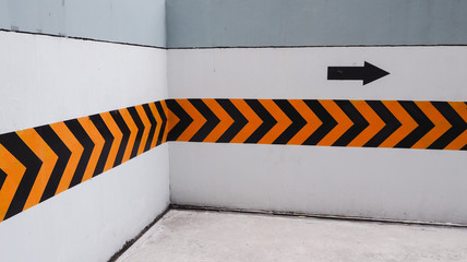 Turn right at this corner, sign on the wall