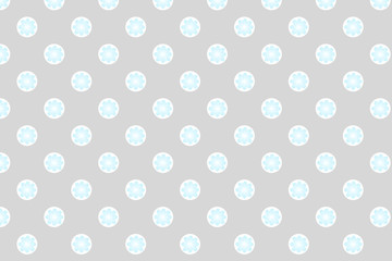 Grey polka dot background with blue flower inside.