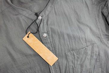 blank price tag on crumpled shirt