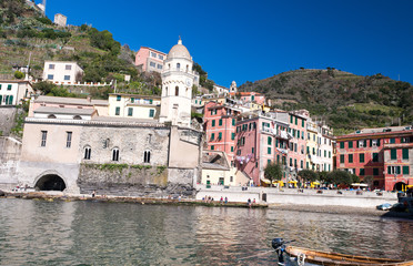 Colorful boats in the quaint port of Vernazza, Cinque Terre - Italy