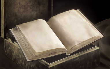 Ancient open book in dark ambiance. Two blank pages with original texture