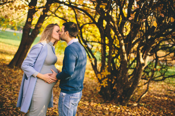 Happy couple in the autumn park