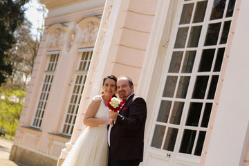 Bride and groom outdoor on their wedding day