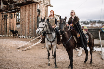 Naklejka na ściany i meble Girls Vikings on horseback