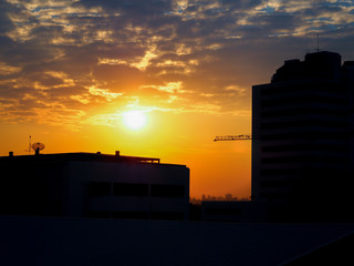Silhouette buildings at sunset and cloudy in bangkok