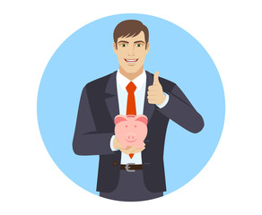 Businessman holding a piggy bank and showing thumb up
