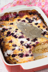 Cottage cheese casserole with peach and blueberry.