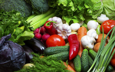 Background of fresh vegetables and greens closeup 