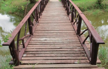 wood Bridge  beautiful over a canal in the park