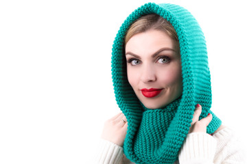 The girl dressed in a bright knitted scarf	